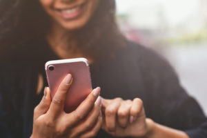 Woman using smart phone