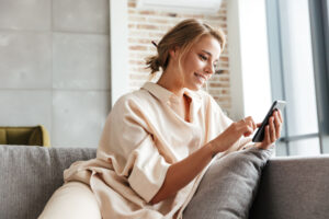 Banking Automation Women smiling looking at phone