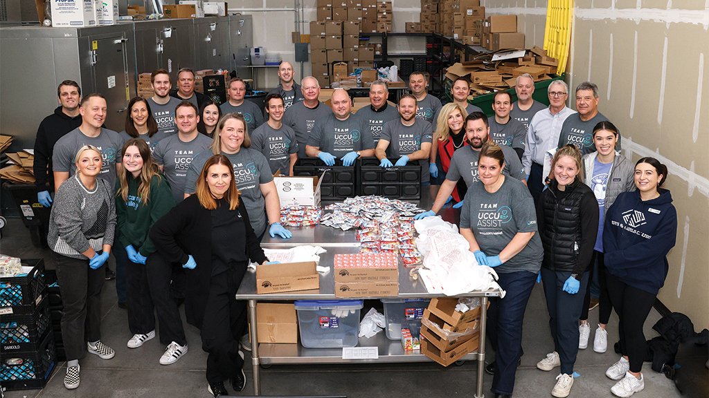 UCCU assist team smiling at camera